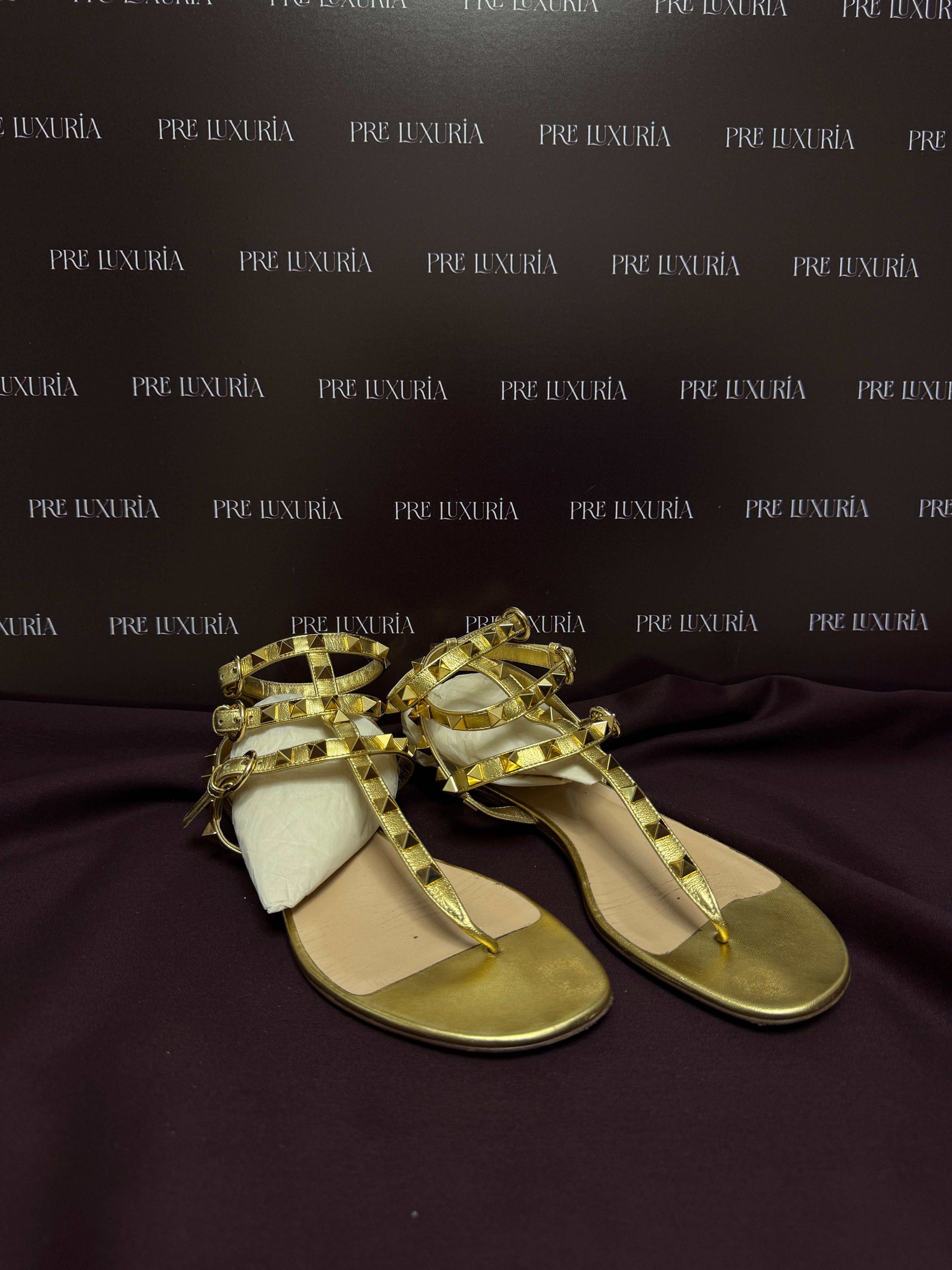 Valentino Garavani Rock-stud Caged Flat Sandals in Gold EU 37