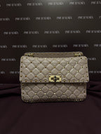 Valentino Garavani Nappa Rockstud Spike in Poudre M