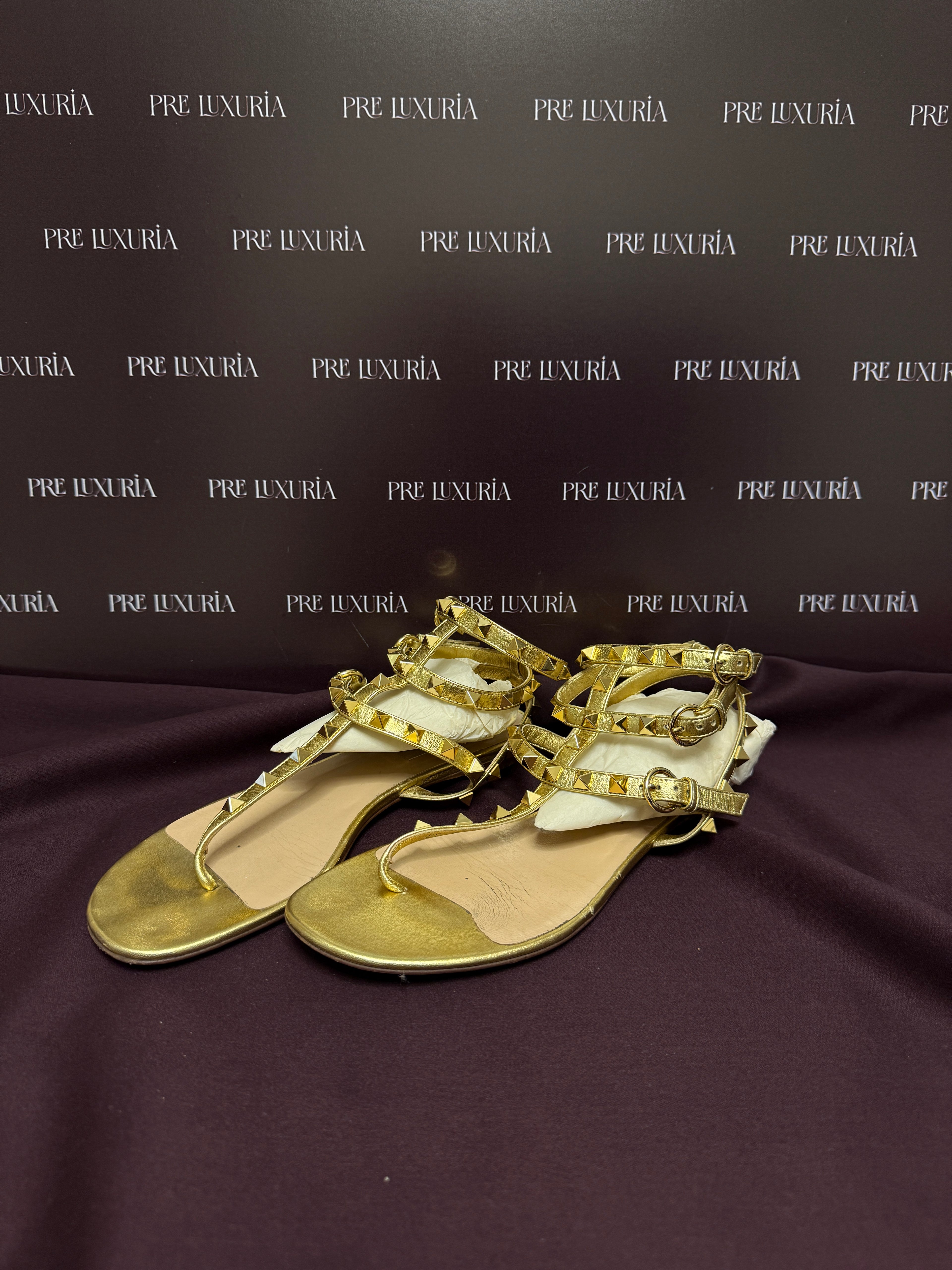 Valentino Garavani Rock-stud Caged Flat Sandals in Gold EU 37